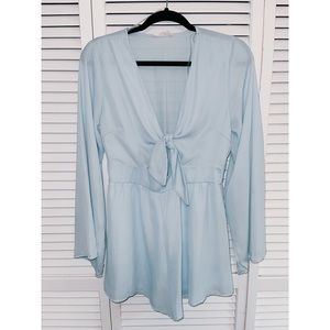 Light baby blue romper with tie front.